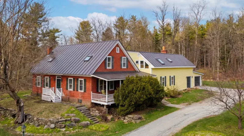 1820 House — restored New England farmhouse with standing-seam metal roof, Stowe VT