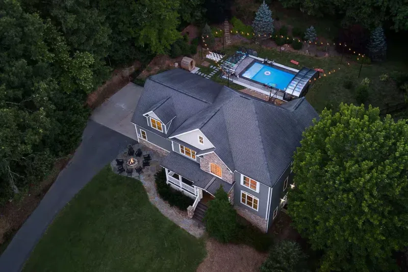 ASH2 Estate — six-bedroom mountain estate with enclosed pool, aerial view, Candler NC