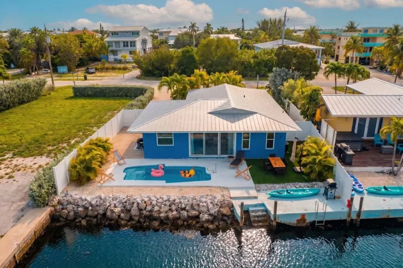 61 Sombrero — blue waterfront home with pool and private dock, Marathon FL