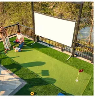 Putting green and outdoor movie screen