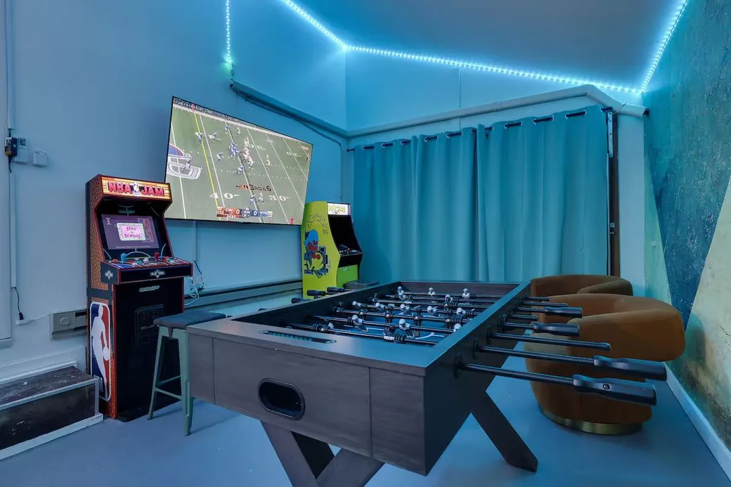 Game room with arcade and foosball
