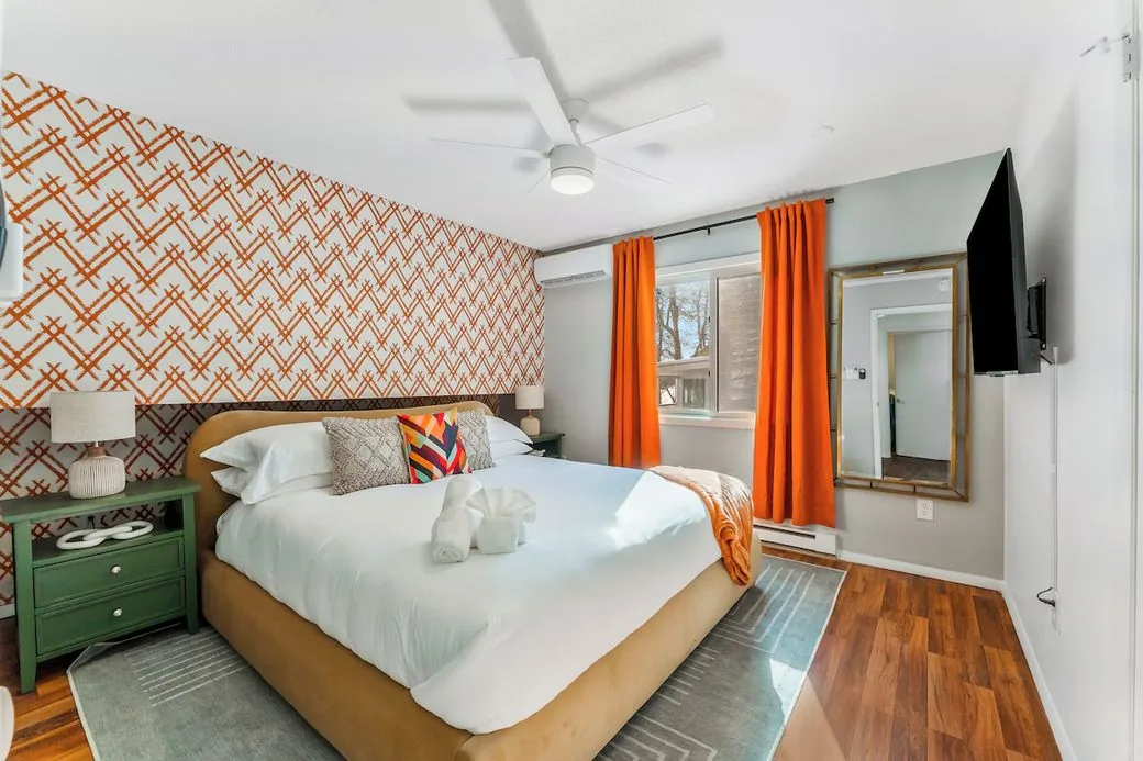 Bedroom with chevron accent wall